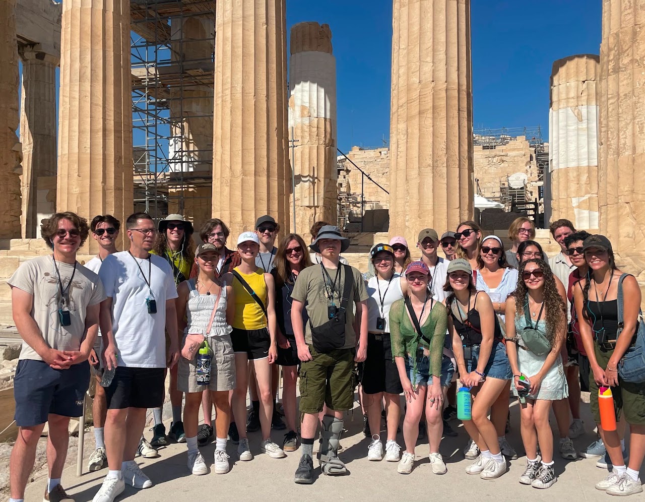 Participants gathered between the columns at the Acropolis in Athens